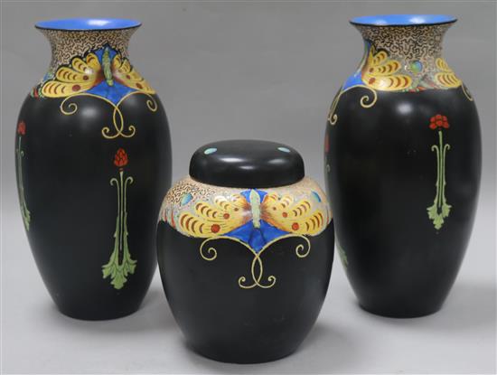 A crown Ducal black glazed pair of vases and a matching ginger jar